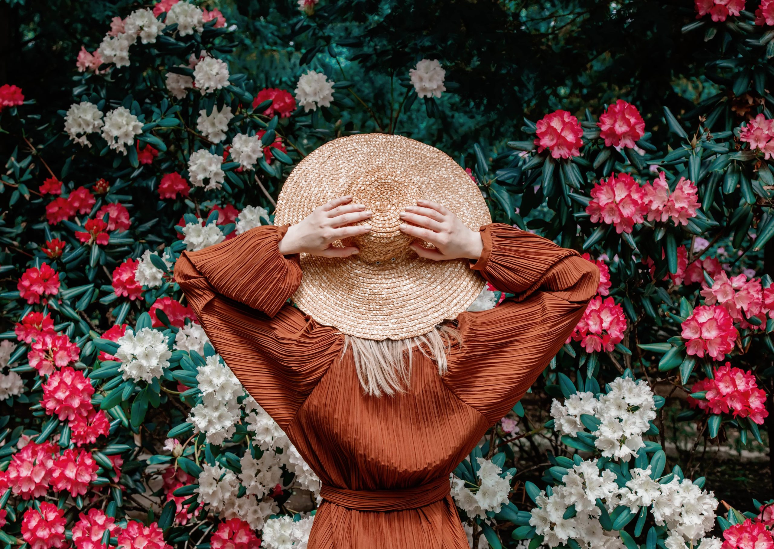 style-woman-near-rhododendron-flowers-in-a-grarden-2022-01-11-22-06-06-utc-min